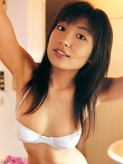 Divine asian babe with plump bouncy boobs in a white bikini